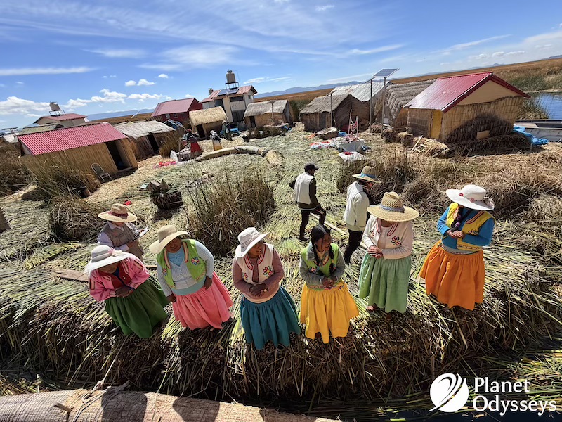 Nestled high in the Andes, Lake Titicaca is a marvel of nature. It is the highest navigable lake in the world. This majestic body of water straddles the border between Peru and Bolivia. Amidst its vast expanse lie the Uros Floating Islands. These islands are a testament to human ingenuity and resilience. Crafted entirely from totora reeds, they float gracefully on the lake's surface. The Uros people have called these islands home for centuries. They originally sought refuge here from hostile neighbors. Today, their unique way of life continues to captivate visitors. Each island is a living, breathing community. The Uros maintain their islands by adding fresh reeds as the old ones decay. This constant renewal is a symbol of their enduring spirit. Visitors to the Uros Floating Island Peru are welcomed with warmth and hospitality. The Uros share their traditions, crafts, and stories with pride. It's an opportunity to experience a culture deeply connected to its environment. A visit to these islands offers more than just stunning views. It provides a glimpse into a lifestyle that harmonizes tradition and modernity. The Uros Floating Islands are a cultural treasure waiting to be explored. The Enchanting Setting: Lake Titicaca and Its Significance Lake Titicaca is more than a geographical wonder. It holds great significance in Andean mythology. Many consider it the birthplace of the Inca civilization. The lake stretches across 3,232 square miles between Peru and Bolivia. Its sparkling waters reflect the sky and surrounding mountains. This creates a magical and serene environment that enchants travelers. Beyond its beauty, the lake serves as a vital resource. Local communities depend on its waters for fishing and transportation. It also supports a unique ecosystem, rich with diverse flora and fauna. Culturally, Lake Titicaca plays a crucial role in the lives of its people. It influences their traditions, beliefs, and folklore. The lake's mystical allure is woven into numerous legends and tales. Key aspects of Lake Titicaca include: It is the highest navigable body of water on Earth, at 3,812 meters above sea level. The lake is shared by two nations, Peru and Bolivia, reflecting its shared cultural heritage. Lake Titicaca nurtures over 500 aquatic species, including endemic fish. Surrounding areas host ancient archaeological sites tied to pre-Columbian civilizations. This extraordinary setting provides a backdrop for exploring the Uros Islands. It invites travelers to immerse themselves in the region's rich cultural and natural tapestry. Origins of the Uros Floating Islands: History and Ingenuity The Uros Floating Islands represent an incredible human innovation. They are a unique response to the challenges posed by the region's history and geography. This ingenuity has enabled the Uros people to thrive on the lake for centuries. Originally, the Uros settled on the islands as a defense mechanism. They sought refuge from aggressive neighboring tribes. By constructing movable islands, they could evade threats and ensure their communities' safety. Creating these islands required significant creativity. The Uros used totora reeds, which grow abundantly in Lake Titicaca. These reeds form the island's base, offering both buoyancy and structure. Maintaining the islands is a continuous process. The reeds decay at the bottom, so new layers are added regularly. This sustains the islands and protects the community. Key historical and innovative practices of the Uros reed island Peru: Using totora reeds for construction and sustenance, including housing and traditional reed boats. Developing movable islands, offering safety and adaptability. Navigating Lake Titicaca's vast waters, cultivating unique fishing techniques. Preserving traditional lifestyles while adapting to modern influences and tourism. This cultural adaptability speaks volumes about the Uros' resilience. Despite environmental and social challenges, they have maintained their way of life. Their history underscores a story of survival and creativity. Through these floating islands, the Uros continue to inspire. They showcase how tradition can blend with practicality to create a sustainable existence. Today, the islands stand as a testament to human ingenuity and cultural persistence. Life on the Reed Islands: Daily Routines and Community Life on the Uros Floating Islands is a delicate balance of tradition and modernity. The residents maintain a lifestyle that has remained relatively unchanged for generations, yet they've adeptly integrated aspects of contemporary life. A typical day begins with the sunrise over Lake Titicaca. The Uros rise early to greet the new day and attend to daily chores. The beauty of their surroundings provides a peaceful start to their busy routines. Fishing is a central part of daily life, vital for both sustenance and economic trade. Men often set out in their reed boats to catch a variety of fish, essential to the Uros diet. Meanwhile, women engage in crafting and weaving. Reed weaving is more than just a necessity; it's an art form. The women create stunning handicrafts and textiles, which are sold to tourists. These crafts reflect the vibrant colors and patterns distinctive to Uros culture. Community life thrives with a strong sense of kinship and cooperation. Shared responsibilities keep the islands running smoothly. Elders play a vital role in passing down knowledge and cultural traditions to younger generations. Celebrations and festivals mark the calendar year with vibrancy. Traditional music, dance, and food are central to these gatherings, strengthening community bonds. Spiritual practices and storytelling also weave through daily life. Key aspects of daily life on the islands include: Fishing as a livelihood and cultural practice. Reed weaving for artistic and economic purposes. Community events that reinforce social connections. Transmission of traditional practices through storytelling and guidance from elders. In this enchanting setting, the Uros balance simplicity with rich cultural traditions. Their way of life offers a profound glimpse into a community that lives harmoniously with its environment. The Art of Reed Construction: Building and Maintaining the Islands The Uros Floating Islands are an extraordinary example of human ingenuity. Crafted from the totora reed, these islands illustrate a unique interaction between nature and human innovation. Creating the islands begins with gathering the essential totora reeds. These plants grow abundantly in Lake Titicaca's shallow waters. The reeds are cut, dried, and layered intricately to form the islands' foundation. The construction technique is both practical and adaptive. The dense layers ensure buoyancy while providing a firm surface. Continuous maintenance is crucial since the lower layers of reeds gradually decay. Every island is a collaborative effort. Families and communities work together to ensure structural integrity. Adding new layers of reeds is a regular task, requiring diligence and unity. Building and maintaining the islands involve: Harvesting totora reeds from the lake. Layering reeds to create a stable, floating platform. Regularly replenishing decayed layers with fresh reeds. Community collaboration for maintaining and repairing the structures. This craftsmanship is not only a necessity but also a cultural expression. The Uros people's expertise in reed construction is passed down through generations. This knowledge stands as a testament to their resilience and enduring way of life. In the interplay of labor and artistry, the islands emerge as both functional habitats and cultural landmarks. They represent a harmonious blend of tradition and skill. Uros Culture: Language, Traditions, and Spirituality The cultural tapestry of the Uros is richly woven with language, rituals, and beliefs. The Uros people primarily speak Aymara, with some fluent in Quechua and Spanish. These languages reflect a deep connection to their heritage and enhance their interactions with visitors. Traditions on the islands are vibrant and full of life. Music and dance play an integral role in Uros culture, serving as vessels for storytelling and celebration. Traditional crafts, such as weaving intricate textiles and crafting reed boats, are taught from generation to generation. The spiritual life of the Uros is deeply tied to Lake Titicaca. The lake is considered sacred, representing a source of life and spiritual sustenance. The Uros people maintain a close connection to nature, evident in their daily practices and rituals. Key aspects of Uros culture include: Preserving Aymara language and engaging in traditional crafts. Celebrating life through music, dance, and oral traditions. Honoring the sacred lake and practicing spiritual rituals. Cultural preservation remains vital for the Uros community. They actively engage in sharing their stories and customs with visitors, ensuring their legacy endures. The islands provide an extraordinary glimpse into a way of life that harmonizes tradition with the natural world. This cultural richness stands as a testament to the resilience and depth of the Uros heritage. The Largest Floating Island: Community Hubs and Social Life The largest of the Uros floating islands acts as the heart of social and cultural life on the lake. Here, several families coexist, fostering a tight-knit community environment. This island serves as a hub for communal activities and shared resources, like schools and meeting areas. Community life revolves around cooperation and mutual support. Families engage in collective tasks such as maintaining the reed structures and organizing local events. Social gatherings often center around communal spaces, where stories, music, and laughter fill the air. Key features of the largest floating island include: Multi-family living with collaborative daily routines. Shared educational facilities and communal meeting spaces. Hosting social events that strengthen community bonds. The island is more than just a living area; it's a place of learning and interaction. Children play and learn together, while adults plan and execute shared projects. This unique social structure reflects the importance of community and togetherness, making life on the floating island both vibrant and harmonious. These social interactions are essential for preserving the rich cultural heritage of the Uros people, ensuring traditions are passed on through generations. Uros Floating Islands Tour: What to Expect and How to Visit Embarking on a Uros Islands tour offers a journey into the captivating world of the Uros people. Visitors can expect a warm welcome as they step onto the soft, springy reed surfaces. Guided tours provide deep insights into the daily life and heritage of these resilient islanders. The tour typically starts with an introduction to the islands' construction. Guides explain the intricate process of weaving totora reeds to form the islands' sturdy base. Visitors often witness a demonstration of how these buoyant islands are maintained and preserved. During your visit, you'll have the opportunity to interact with the island's inhabitants. The Uros people gladly share their traditions, languages, and crafts. Handmade souvenirs, like vibrant textiles and intricate reed boats, are available for purchase, offering a piece of Uros culture to take home. Key experiences to anticipate on an Uros islands tour include: Educational talks on reed island construction and maintenance. Interactive sessions with the Uros people, including craft demonstrations. Stunning views of Lake Titicaca's expansive, serene waters. Travelers interested in an immersive experience might consider staying overnight. Some islands offer homestays, providing a firsthand glimpse into daily life. These stays support the community while offering a truly unique perspective on life in this tranquil setting. Access to the Uros Islands typically begins in Puno, the region's gateway city. From there, numerous tour operators offer packages to suit various interests and budgets. Whether opting for a brief visit or a longer stay, the Uros Floating Islands promise an unforgettable cultural encounter on the shimmering waters of Lake Titicaca. Responsible Tourism: Supporting the Uros and Sustainable Travel Visiting the Uros Floating Islands offers a chance to embrace responsible tourism. By supporting the Uros community, travelers contribute to preserving their unique way of life. A mindful approach to visiting helps protect the delicate environment of Lake Titicaca. Sustainable travel emphasizes respect for both cultural heritage and natural resources. Visitors are encouraged to engage thoughtfully with the community, gaining genuine insights into their traditions. Purchasing locally made crafts directly supports the artisans, providing them with a vital source of income. To ensure a positive impact, consider these tips for responsible tourism: Choose tour operators committed to sustainability and local partnerships. Follow the community's guidelines for behavior and interactions. Avoid using single-use plastics, minimizing waste on the islands. While exploring the floating islands, travelers can foster cultural exchange through respectful dialogue. This engagement enriches the visitor experience while honoring the profound spiritual connection the Uros people have with their land. Together, visitors and locals can create a travel experience that benefits all, safeguarding the islands for future generations. As a result, the enduring spirit and resilience of the Uros community continue to thrive in harmony with their environment. Practical Tips for Content Creators and Travel Agents Content creators seeking to capture the essence of the Uros Floating Islands should prioritize authenticity. Immersing themselves in local experiences will enrich their narratives. Engage deeply with the residents, learning about their daily lives and traditions. For travel agents, crafting an itinerary that highlights both cultural and natural elements is key. Ensure that tours include interactive experiences, such as observing reed boat building or participating in local dance performances. Highlighting the ingenuity and adaptability of the Uros people can make itineraries stand out. To maximize the impact of your content or travel packages, consider the following: Engage with local guides for insider perspectives. Feature compelling visuals like sunrise over Lake Titicaca. Emphasize sustainable practices in your narratives or tours. Incorporating these elements not only elevates the quality of your content but also strengthens the cultural understanding of your audience or clients. By showcasing the vibrant culture of the Uros Islands, you can inspire others to explore these remarkable floating communities responsibly. This approach benefits both the community and the broader travel landscape by fostering appreciation and respect for indigenous cultures. Conclusion: Preserving Heritage and Inspiring Exploration The Uros Floating Islands stand as a powerful testament to human resilience and creativity. They remind us of the importance of sustaining cultural traditions amidst modern challenges. By visiting these unique islands, travelers are invited to witness an ancient lifestyle preserved through generations. The experience of exploring the Uros Islands offers more than just a picturesque setting. It provides a deep cultural insight and an appreciation of sustainable living practices. Whether you're a content creator or a travel agent, sharing the story of the Uros Floating Islands can inspire others to seek out and respect indigenous cultures around the globe. By promoting responsible tourism, we contribute to preserving this heritage for future adventurers.