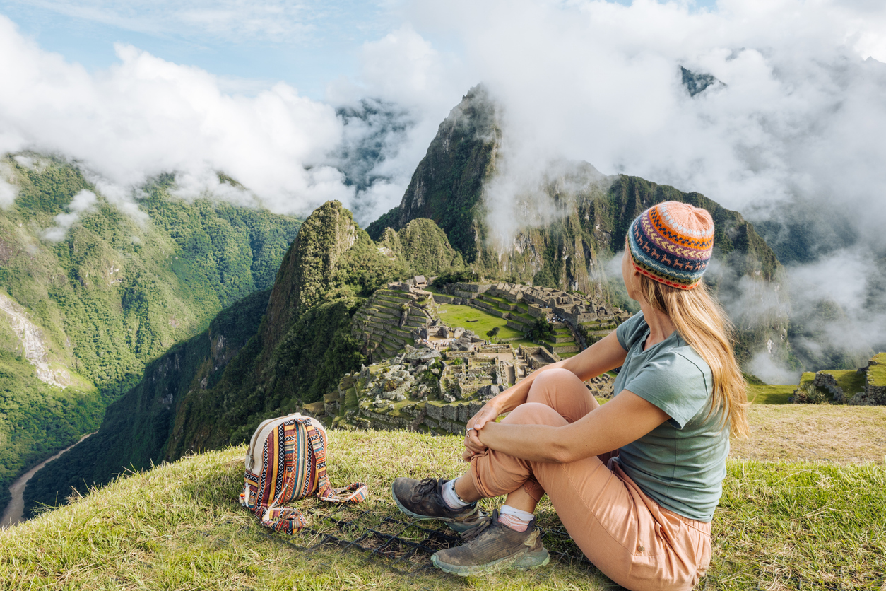 Woman Admiring Machu Picchu View in Casual Attire